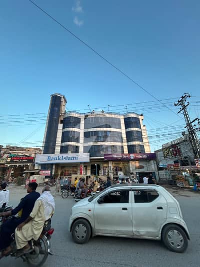 SHOP FOR RENT ADYALA TOWER, Rawalpindi. Ideal For Pharmacy, Clinic, Or Retail. Spacious Shop With Glass Door, Bright Lighting, On Main Road With Parking. CCTV-Enabled, Rs. 20,000/Month.