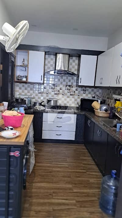 100 YARDS DOUBLE STOREY BUNGALOW FOR SELL IN DHA PHASE 7 EXT WITH FULL BASEMENT