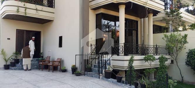 1 Kanal Double Storey House Available for Rent Spacious Family Home | Beautiful Garden | Prime Location