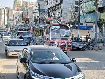 Plot For Sale Facing Main Rashid Minhas Road In Between Nipa And Gulshan Chowrangi