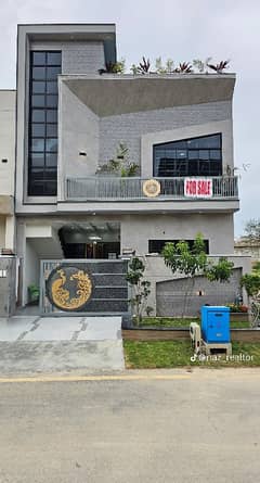 5 Marla Double Unit designer House Available. For Sale in Faisal Town F-18 Islamabad. 5 Marla Double Unit designer House Available. For Sale in Faisal Town F-18 Islamabad.