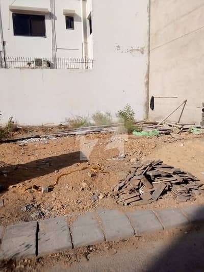 100 Sq. Yards Plot DHA Phase 7 Extension, Karachi Prime Location Near Fatima Masjid Ideal For Investment Or Future Construction.