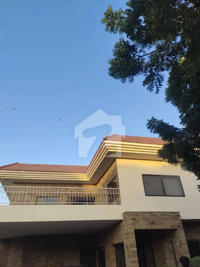 MAGNIFICENT 1000 SQ YD 7-BEDROOM PALATIAL BUNGALOW FOR SALE IN DHA PHASE 5