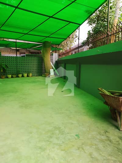 Prime Commercial Opportunity: Spacious 600 Sq Yard Bungalow Prime Commercial Opportunity: Spacious 600 Sq Yard Bungalow