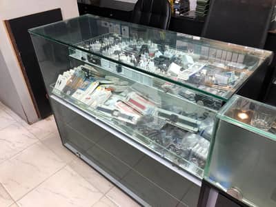Running Commercial Mobile Shop For Sale Imperial Market, Raja Bazar, Rawalpindi Monthly Rent Rs. 55,000/-