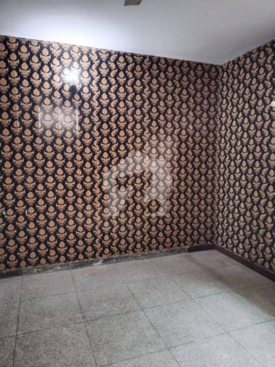 10 Marla Double-Story House for Sale in C Block Faisal Town Lahore