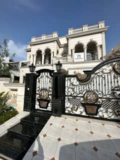 One Kanal Brand New Spanish Faisal Rasul Design Most Beautiful Bungalow 2 Servant Quarter In Basement For Sale At Prime Location Of DHA Lahore Near To Park Masjid & Commercial Market.