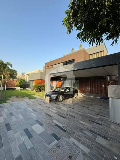 2 Kanal Slightly Used Luxury Ultra-Modern Design Most Beautiful Bungalow For Sale at Prime Location of DHA Lahore Near To Park Masjid & Commercial Market .