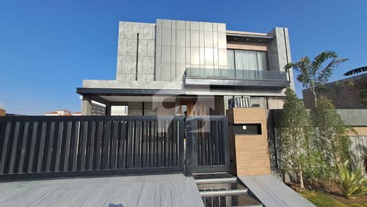 One Kanal Slightly Used Ultra Modern Designer Owner Build Fully Furnished Bungalow 25KV Solar Installed For Sale At Prime Location Of DHA Lahore Near To Park Masjid & Commercial Market.