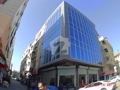 100 Yards Commercial THREE SIDE CORNER BUILDING AVAILABLE FOR SALE.