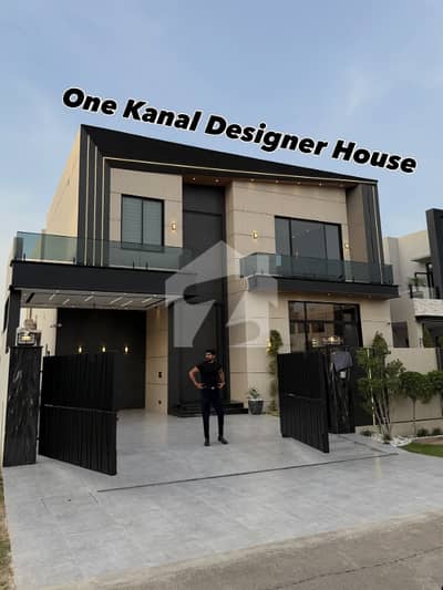 1 KANAL ELEGANT AND FULLY MAINTAINED SUPER HOT LOCATED BUNGALOW WITH BASEMENT SERVANT QUARTERS IS AVAILABLE IN THE BEST BLOCK OF DHA LAHORE. 1 KANAL ELEGANT AND FULLY MAINTAINED SUPER HOT LOCATED BUNGALOW WITH BASEMENT SERVANT QUARTERS IS AVAILABLE IN THE BEST BLOCK OF DHA LAHORE.