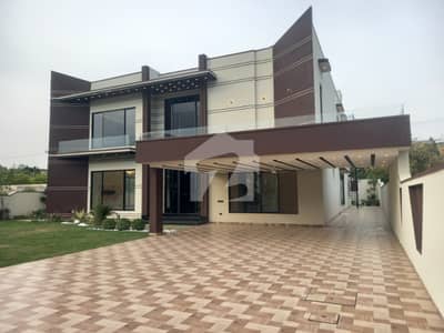 2 KANAL 12 MARLA NEW DESIGNER HOUSE WITH SWIMING POOL AND MOVIE CINEMA
