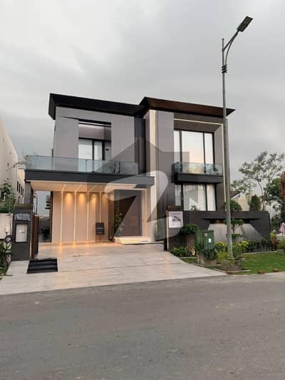 One Kanal Corner Brand New Luxury Ultra-Modern Design Most Beautiful Fully Furnished Bungalow 2 Servant Quarter In Basement For Sale At Prime Location Of DHA Lahore Near To Park Masjid & Commercial Market.