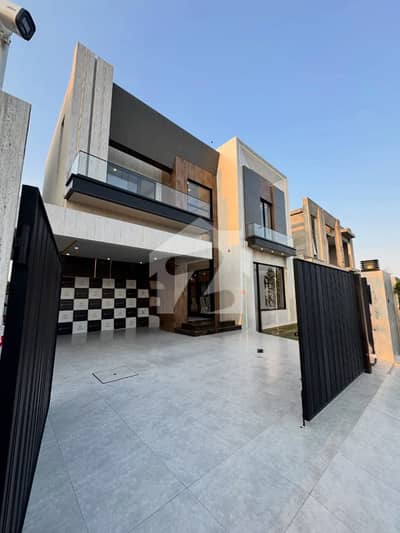 ULTRA MODERN DESIGN 1 KANAL ELEGANT AND SUPER HOT LOCATED BUNGALOW IS AVAILABLE IN THE BEST BLOCK OF DHA LAHORE.