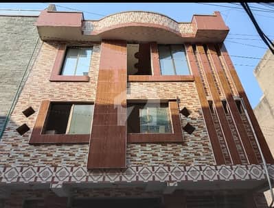8 MARLA COMMERCIAL BUILDIND 4 STORIES WITH BASEMENT PRIME LOCATION FOR SALE IN ALI TOWN LAHORE