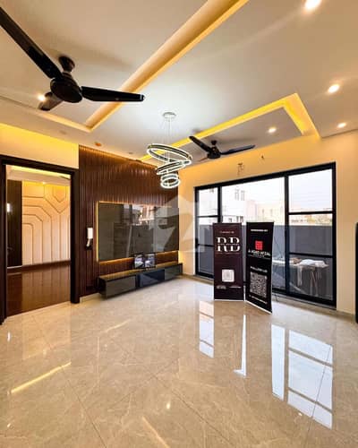 Stylish Brand New 9 Marla House with Rooftop Terrace & Basement in Prime DHA Location