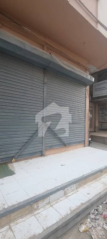 GULSHAN IQBAL BLOCK 4 MAIN ROAD BACK SIDE SHOP