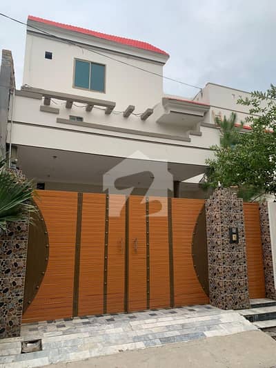 12 Marla Residential Property Featuring Two Separate House Units With Separate Entrances.