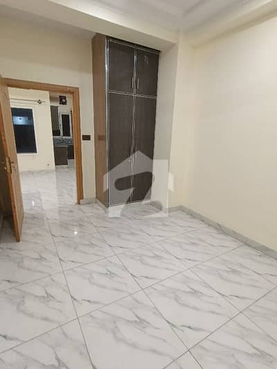 2 Bed Lounge Family Building