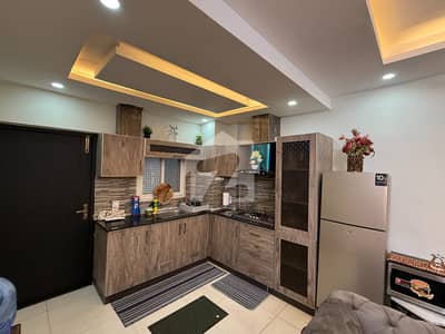 E11 One Bedroom Fully Furnished Apartment Available For Rent