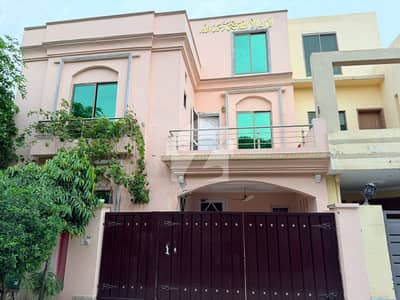 WELL-MAINTAINED 5 MARLA HOUSE FOR SALE IN THE HEART OF BAHRIA TOWN LAHORE AFFORDABLE PRICE IDEAL FOR FAMILIES & INVESTOR