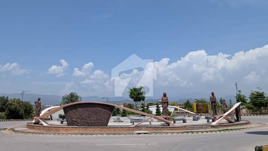 Sector B 6 Marla Corner with 1 Marla Extra Land Two Side Open Best Location Solid Land Plot for Sale