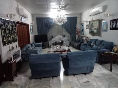 One Kanal Used Modern Design Bungalow For Sale At Prime Location Of DHA Lahore Near To Commercial Market.