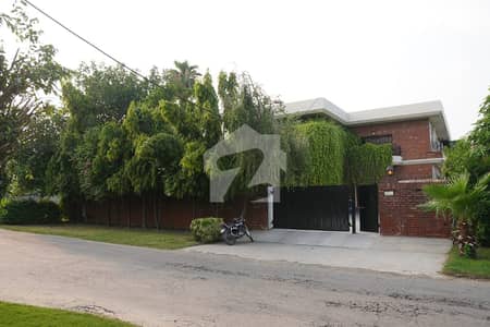 70 Marla Corner Used Modern Design 2 Gates 10 Bed Rooms Separate Entrance Bungalow For Sale At Prime Location Of DHA Lahore Best For 2 Families