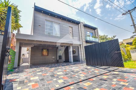 22 Marla Corner Modern Design Most Beautiful Full Basement 7-Bedroom 3-Kitchen Facing Park Bungalow For Sale At Prime Location Of DHA Lahore Near To Park Masjid & Gold Crest Mall.