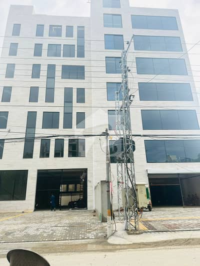 1 KANAL 7 STORY COMMERCIAL BUILDING, 2 LIFTS, M/F WASHROOMS NEAR CANAL FOR RENT