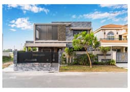One Kanal Brand New Luxury Ultra-Modern Design Only 6 Month Use Most Beautiful Fully Furnished Bungalow 2 Servant Quarter In Basement For Sale At Prime Location Of DHA Lahore Near To Park Masjid & Commercial Market.