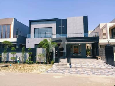 1 KANAL ELEGANT AND FULLY MAINTAINED SUPER HOT LOCATED MODERN BUNGALOW IS AVAILABLE IN THE BEST BLOCK OF DHA LAHORE