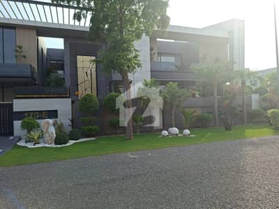 SYED BROTHERS PROUDLY OFFERS: 2-Kanal Elegant And Fully Furnished Modern Bungalow With Swimming Pool Is Available In The Best Block Of DHA Lahore.
