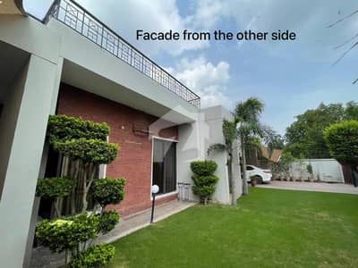 SYED BROTHERS PROUDLY OFFERS: 2-Kanal Elegant Duplex Double Unit Bungalow Is Available In The Best Block Of DHA Lahore.