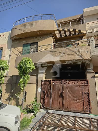 Wapda Five Marla Proper Triple Unit House In G3 Block On 40 Feet Road Four Bedrooms Marble Floor.