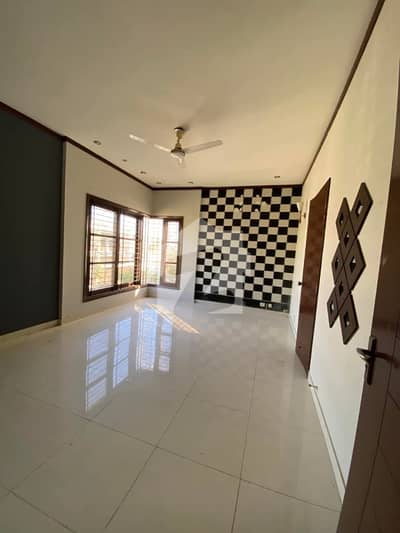 A Spacious And Well-Maintained Bungalow Available For Rent In The Heart Of DHA Phase 6, Ideal For Comfortable Family Living. .