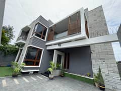 Luxury 600 Yards Slightly Used Bungalow For Rent In DHA Phase 6 With Full Basement And Double Unit Layout
