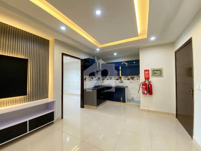 ONE BED SEMI FURNISHED APARTMENT FOR SALE AT INVESTOR RATE IN BAHRIA TOWN LAHORE