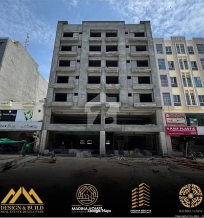 Madina Height 4: Ground Floor Commercial Shop No 3 For Sale in Bahria Town Sector B Umar Block Safari Park. Madina Height 4: Ground Floor Commercial Shop No 3 For Sale in Bahria Town Sector B Umar Block Safari Park.