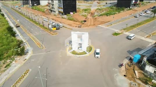 One Kanal Plot Available For Sale With All Basic Amenities On Top Class Location Of Johar Blvd Near School And Central Park Sector B DHA Phase 5 Islamabad.