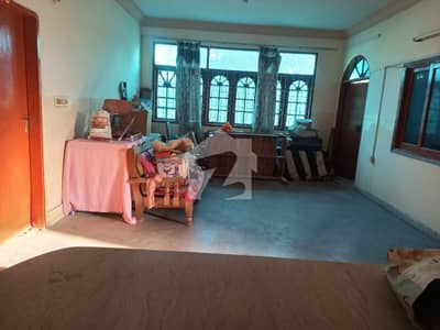 Corner House For Sale Used For Commercial Purposes Has Five Shops Inside