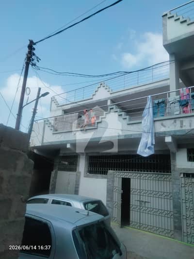 350 yard double story corner banglow opposite printing press