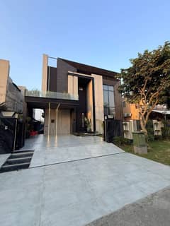 Fully Furnished With Pool 1 Kanal Brand New House For Sale in DHA Phase 6 Prime Location Near To Dolmen Mall And Commercial.