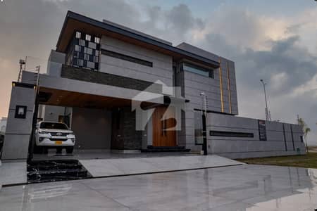 SYED BROTHERS PROUDLY OFFERS: 1-Kanal Elegant And Fully Maintained Modern Brand New Bungalow Is Available In The Best Block Of DHA Lahore.