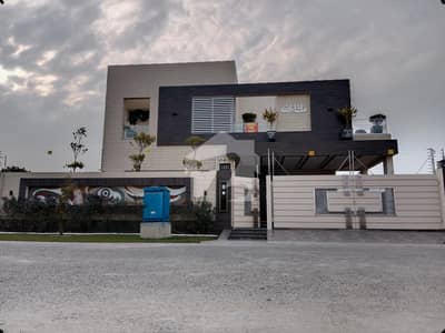 SYED BROTHERS PROUDLY OFFERS: 1-Kanal Elegant And Fully Maintained Modern Brand New Bungalow Is Available In The Best Block Of DHA Lahore.