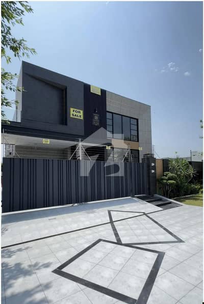 SYED BROTHERS PROUDLY OFFERS: 1 Kanal Modern House For Sale in DHA Phase 6 | With Full Basement & Theater.