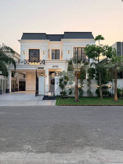 SYED BROTHERS PROUDLY OFFERS: 1-Kanal Elegant And Fully Maintained Neo Classic Bungalow with Swimming Pool Is Available In The Best Block Of DHA Lahore.