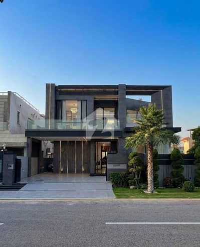 SYED BROTHERS PROUDLY OFFERS: 1-Kanal Elegant And Fully Maintained Modern Bungalow Is Available In The Best Block Of DHA Lahore.
