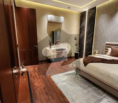 BRAND NEW 1-KANAL ELEGANT AND FULLY FURNISHED SUPER HOT LOCATED BUNGALOW IS AVAILABLE IN THE BEST BLOCK OF DHA LAHORE.
