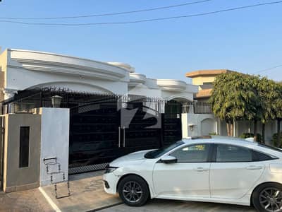SYED BROTHERS PROUDLY OFFERS: 1-Kanal Elegant And Fully Maintained Single Story Bungalow Is Available In The Best Block Of DHA Lahore.